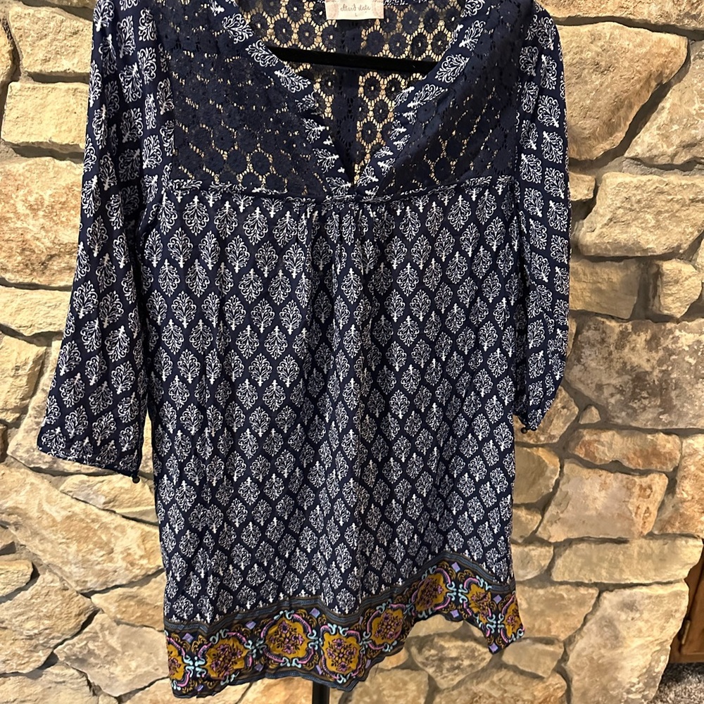 Alia Navy and White Patterned Blouse with Vibrant Hem